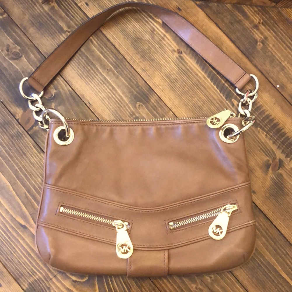 Michael Kors brown purse with gold hardware